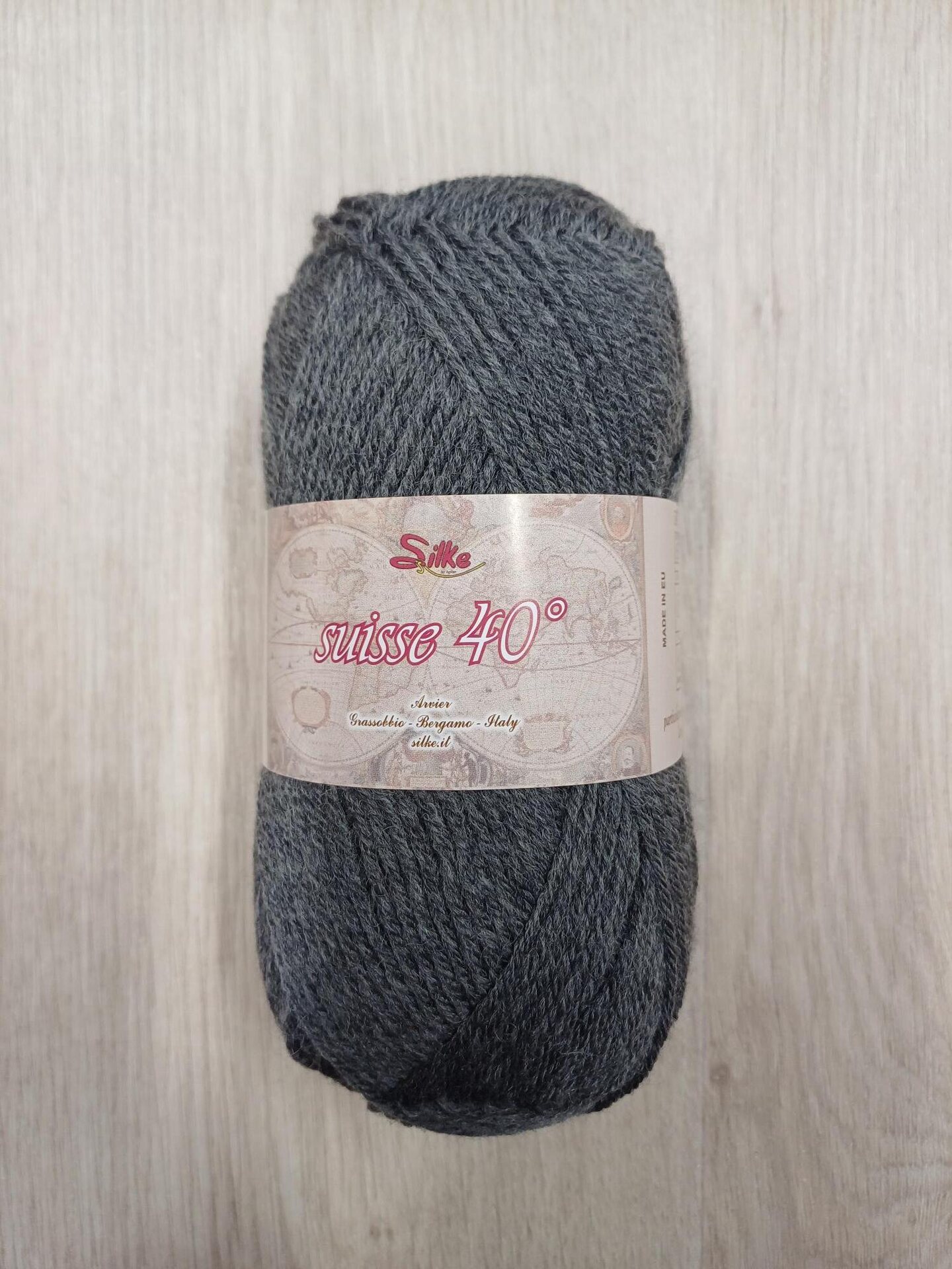 Suisse 40 834 tummanharmaa