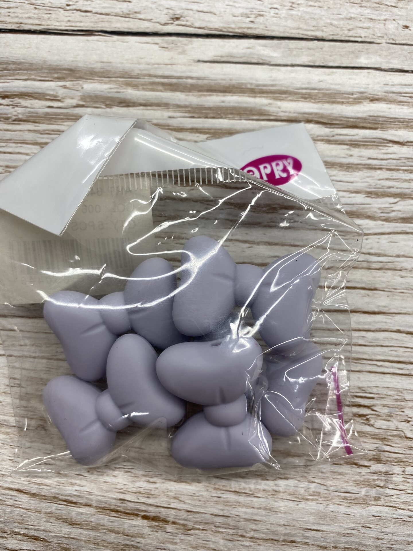 Opry Silikoniset tuttinauhatarvikkeet Helmi vaaleanharmaa rusetti 5kpl/ pss