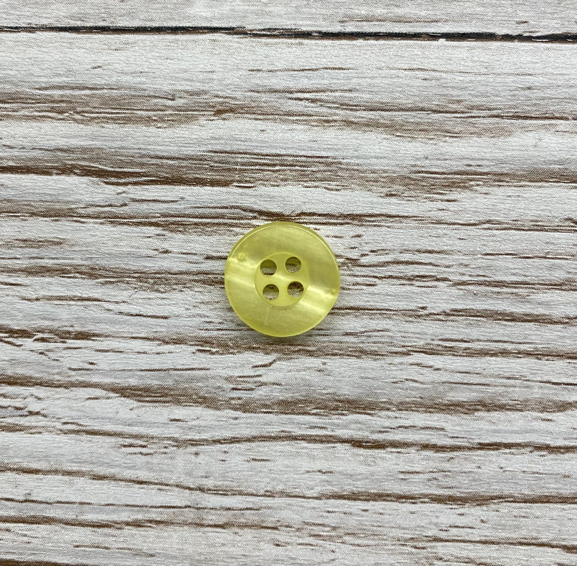 Perus-oivat napit 10 mm keltainen